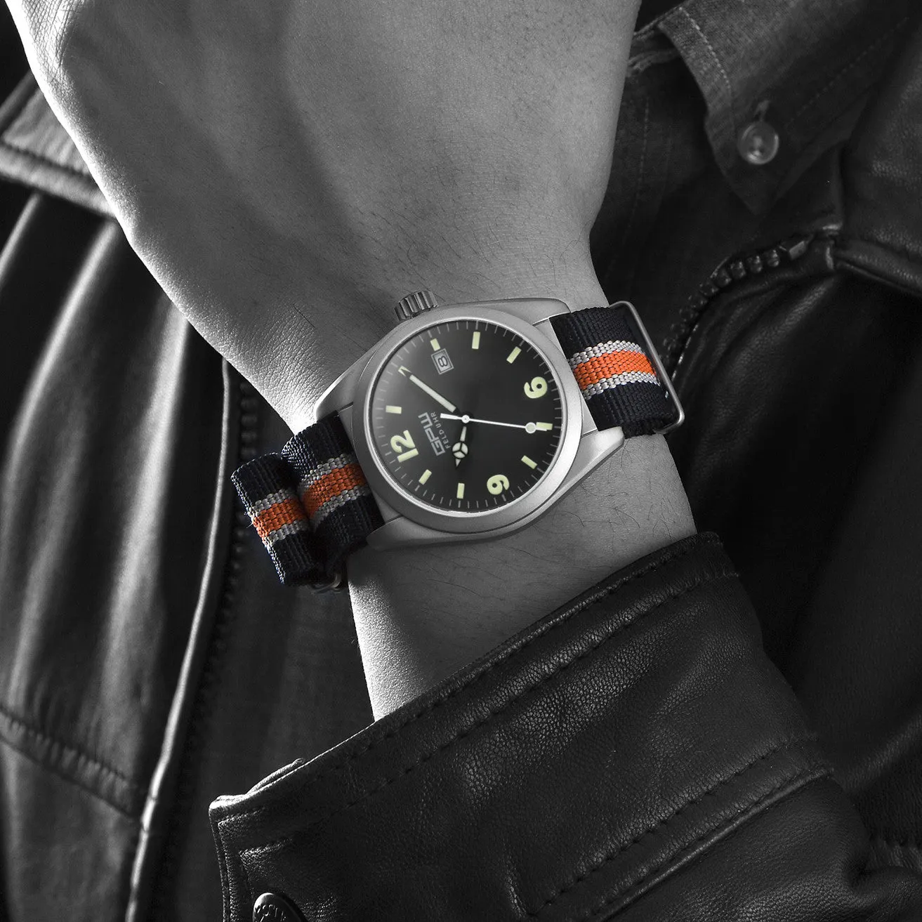 German Military Titanium Watch. GPW Fieldwatch Automatic. 200M W/R. Sapphire Crystal. Black White & Orange Nylon Strap.